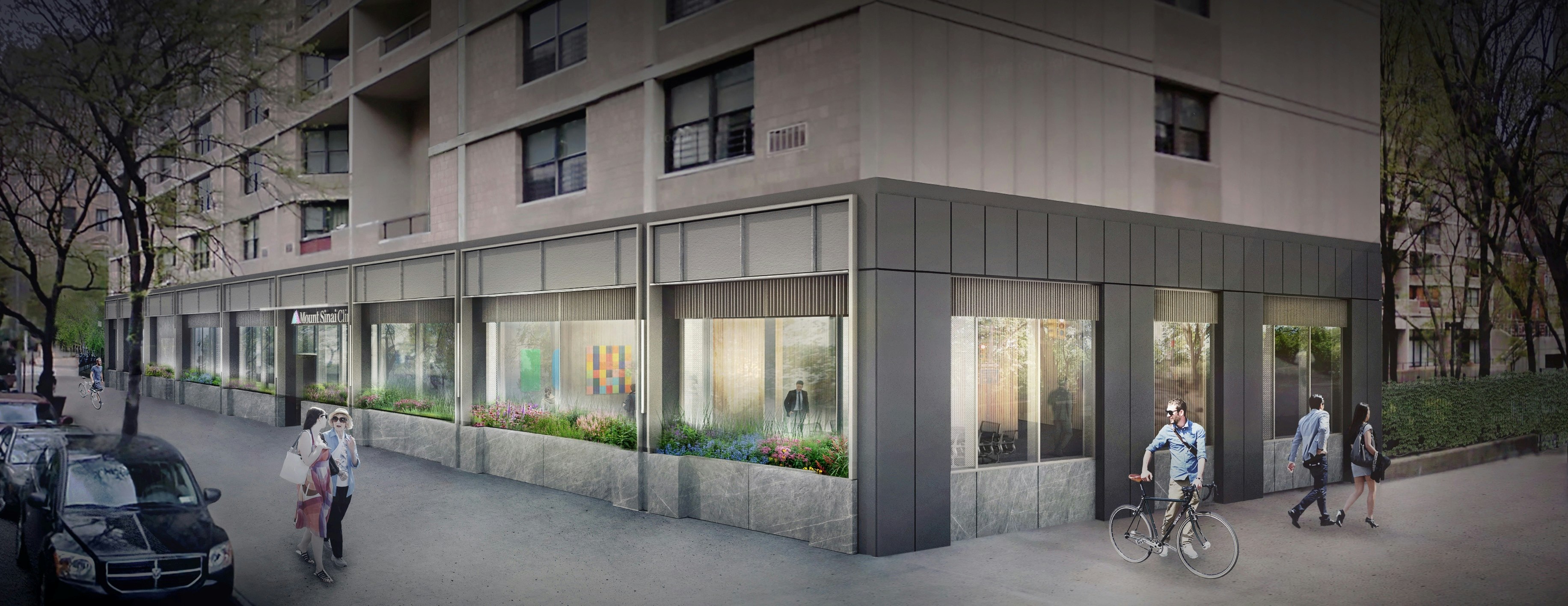 Street view of a modern healthcare facility, Mount Sinai CIinic, located at the ground level of a residential building. The facade features large glass windows revealing a brightly lit interior with art on display and visible waiting areas. Planters with colorful flowers line the sidewalk, and pedestrians and cyclists pass by under tree-lined surroundings.